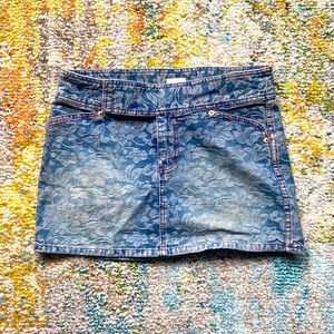 Denim mini skirt with flower pattern